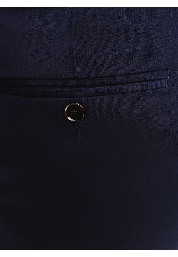 Pako Lorente - PAKO LORENTE – Wełniane spodnie garniturowe w kolorze granatowym. Okazja: na spotkanie biznesowe. Kolor: niebieski. Materiał: wełna. Styl: biznesowy, elegancki