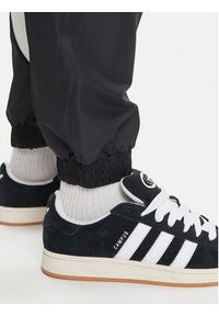 Adidas - adidas Spodnie dresowe Stadium JN1830 Czarny Loose Fit. Kolor: czarny. Materiał: syntetyk #4