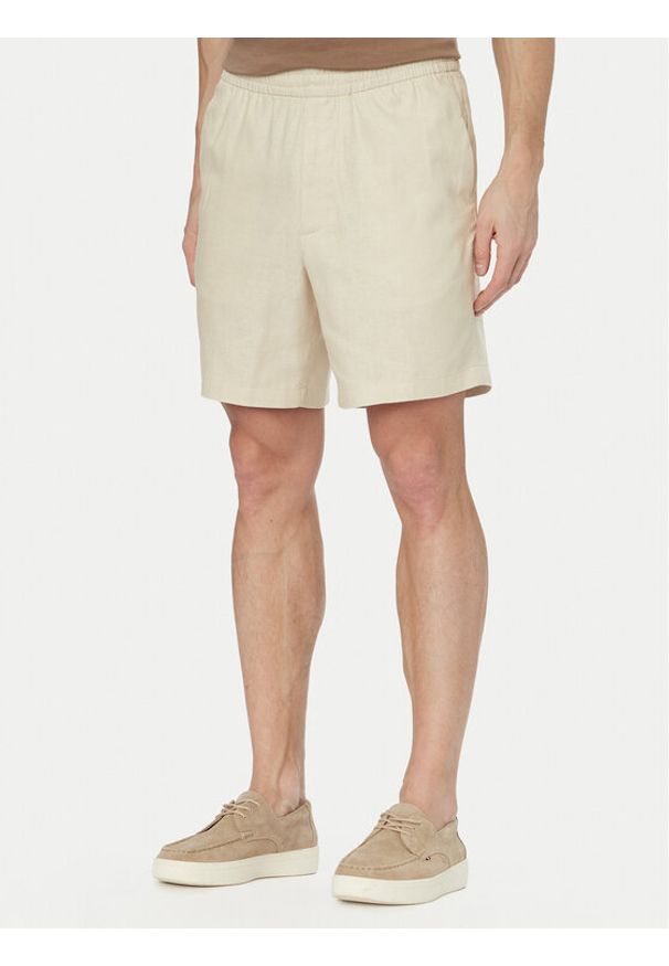 Calvin Klein Szorty materiałowe LV04LF620G Beżowy jasny Straight Fit. Kolor: beżowy. Materiał: bawełna