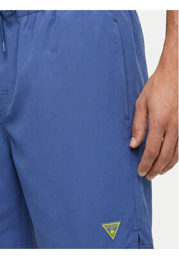 Guess Szorty kąpielowe F6GT24 WG282 MEDIUM Niebieski Regular Fit. Kolor: niebieski. Materiał: syntetyk