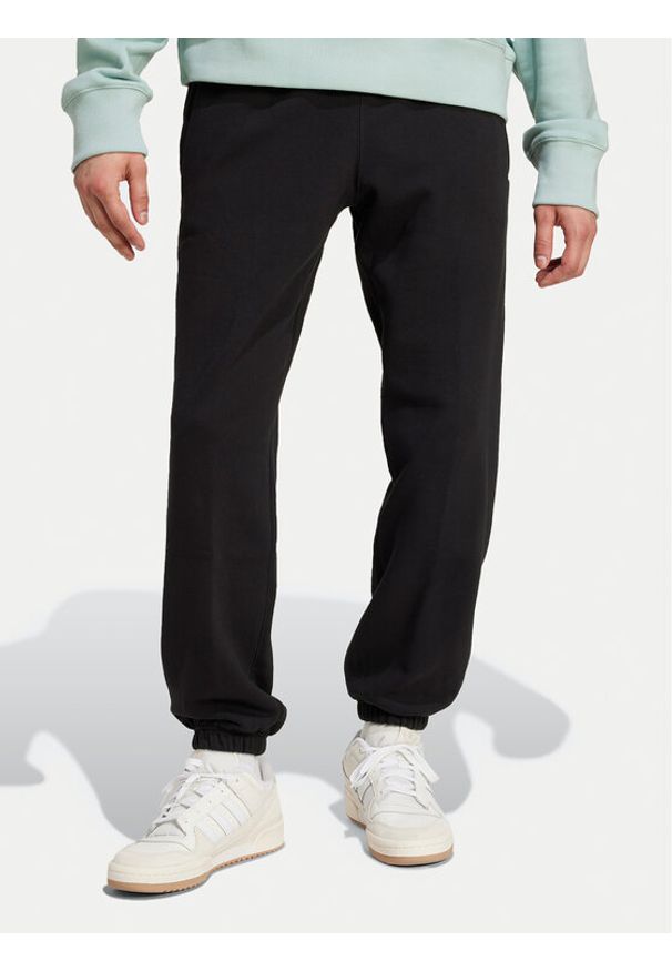 Adidas - adidas Spodnie dresowe Premium Essentials IY2245 Czarny Loose Fit. Kolor: czarny. Materiał: bawełna