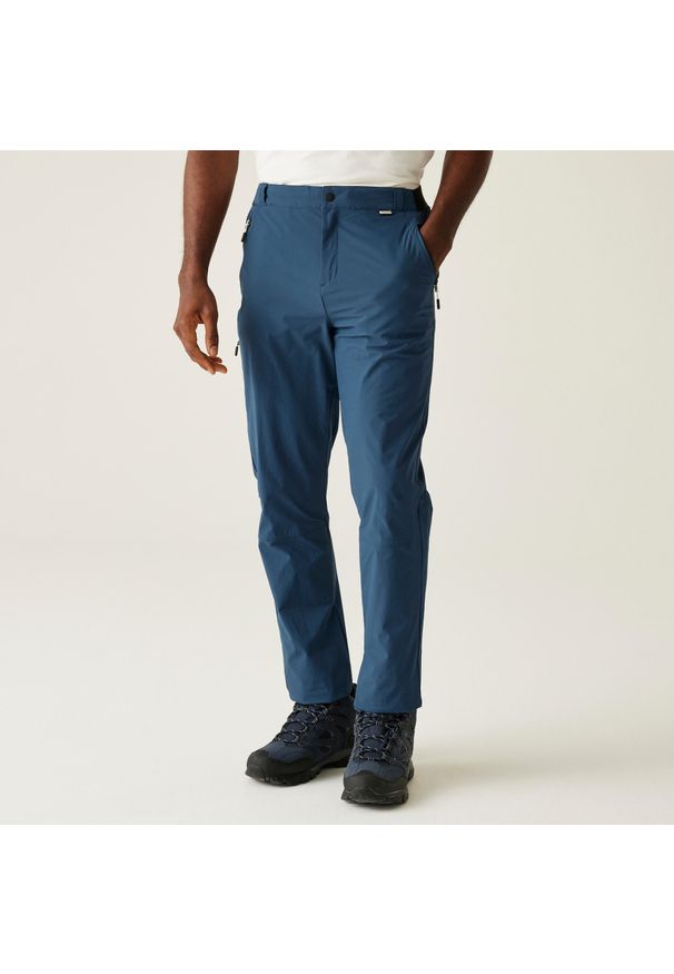Regatta - Męskie spodnie podróżne Light Packaway. Kolor: niebieski. Materiał: materiał. Sezon: lato. Sport: turystyka piesza