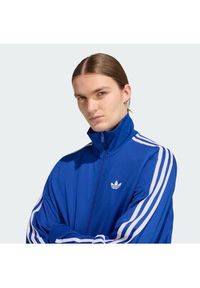 Adidas - adidas Bluza adicolor Firebird KE0790 Niebieski Loose Fit. Kolor: niebieski. Materiał: syntetyk #4