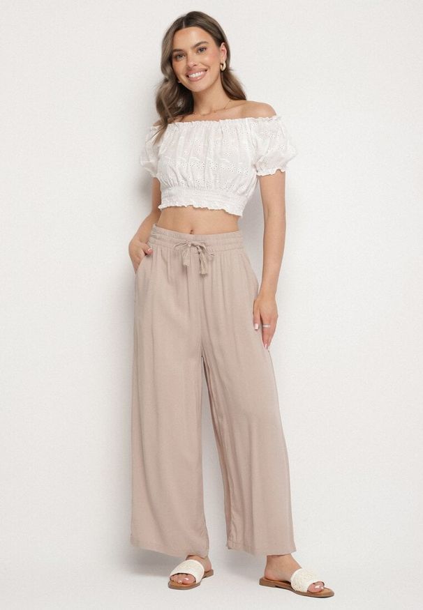 Born2be - Beżowe Wiskozowe Spodnie o Szerokim Kroju Ozdobione Sznurkiem Natamia. Okazja: na co dzień, na spotkanie biznesowe. Kolor: beżowy. Materiał: wiskoza. Wzór: aplikacja. Styl: biznesowy, casual, elegancki, klasyczny