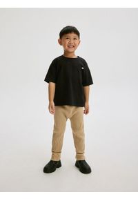 Reserved - Legginsy z prążkowanej dzianiny - beżowy. Kolor: beżowy. Materiał: dzianina, prążkowany