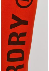 Superdry - Legginsy. Kolor: pomarańczowy. Materiał: dzianina. Wzór: nadruk #4