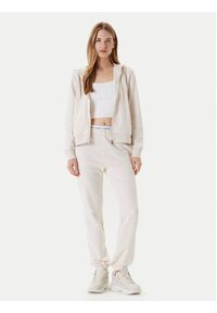 Guess Spodnie dresowe O5RB01 KCO31 Beżowy Regular Fit. Kolor: beżowy. Materiał: bawełna