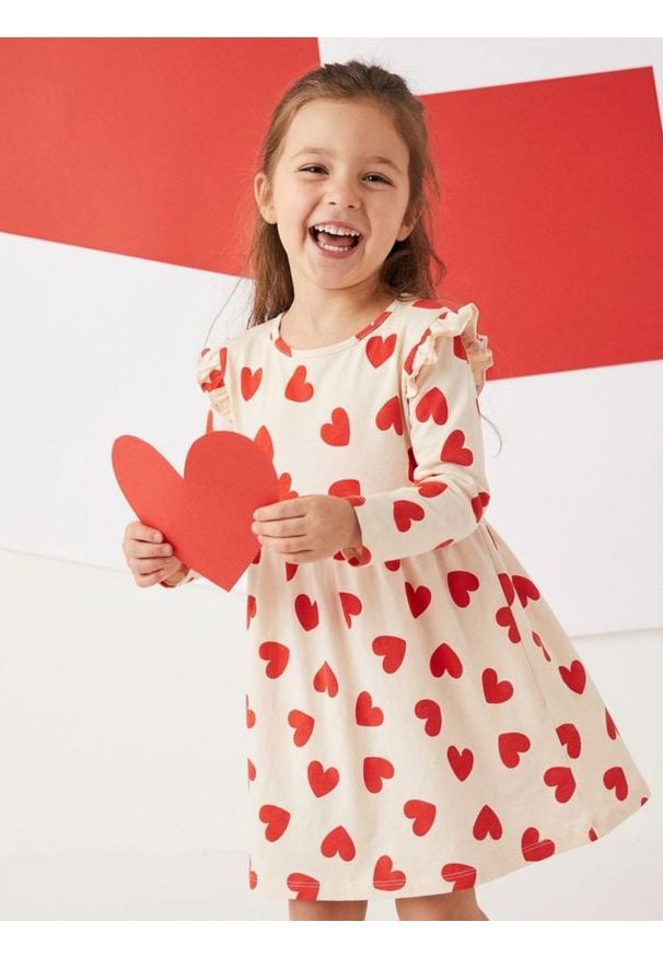 Sinsay - Sukienka dresowa ze wzorem w serca - kremowy. Kolor: kremowy. Materiał: dresówka