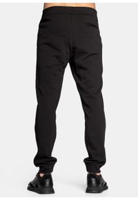 Spodnie dresowe męskie czarne Armani Exchange 8NZPPA ZJ1ZZ 1200. Kolor: czarny. Materiał: dresówka. Sport: turystyka piesza #4