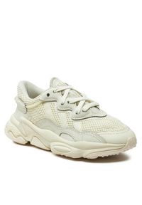 Adidas - adidas Sneakersy Ozweego Kids IE2781 Beżowy. Kolor: beżowy. Materiał: materiał