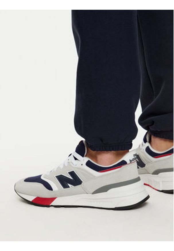 Champion Spodnie dresowe 220709 Granatowy Relaxed Fit. Kolor: niebieski. Materiał: bawełna