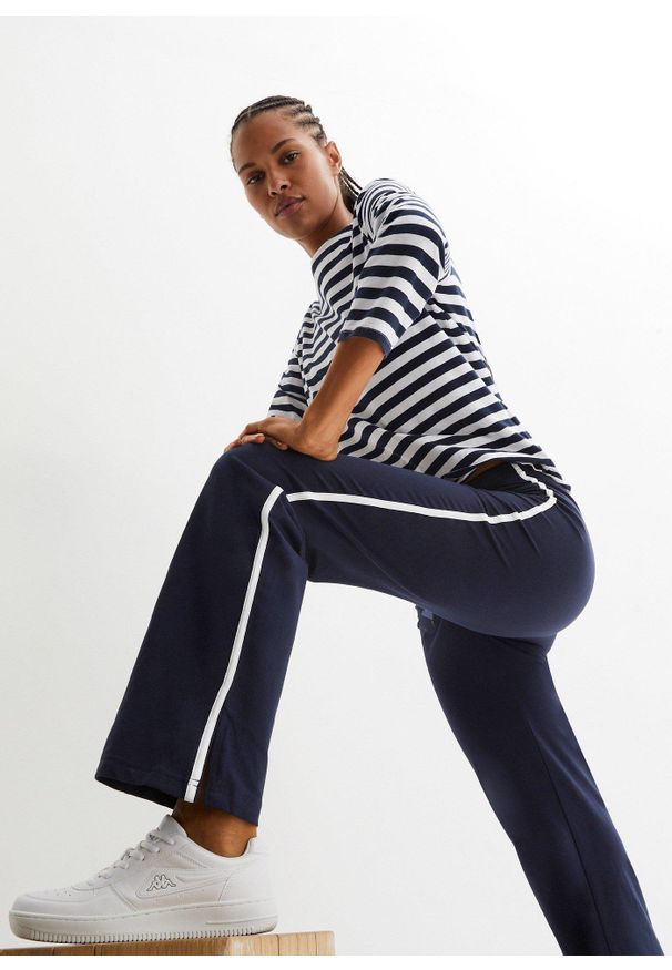 bonprix - Spodnie z bawełnianego dżerseju ze stretchem. Kolor: niebieski. Materiał: jersey, bawełna. Styl: sportowy