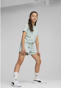 Puma - Młodzieżowa koszulka FLAMING LOVE z nadrukiem na całej powierzchni PUMA. Kolor: zielony. Wzór: nadruk