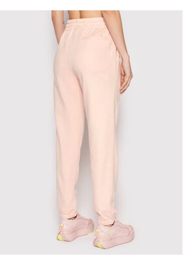 New Balance Spodnie dresowe Unisex UP21500 Różowy Athletic Fit. Kolor: różowy. Materiał: bawełna