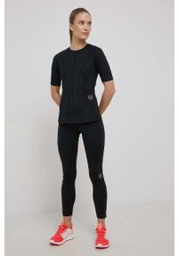 Adidas by Stella McCartney - adidas by Stella McCartney t-shirt treningowy HD9103 kolor czarny. Okazja: na plażę. Kolor: czarny. Materiał: skóra, dzianina, materiał. Wzór: ażurowy, ze splotem #4