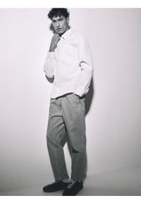 Reserved - Jeansy carrot fit - niebieski. Kolor: niebieski