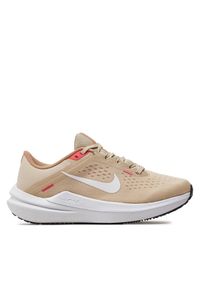 Buty do biegania Nike. Kolor: beżowy