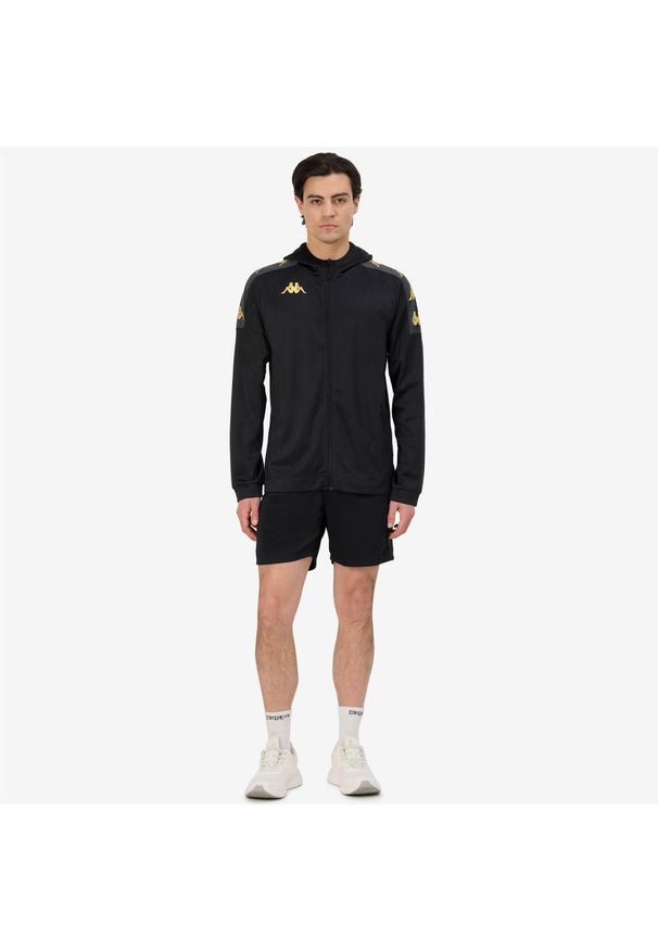 Kurtka z dresu Kappa Grevolo. Kolor: czarny. Materiał: dresówka. Sport: piłka nożna, fitness