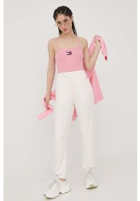 Champion spodnie dresowe 115098 damskie kolor różowy gładkie 115098-EM004. Kolor: różowy. Materiał: dresówka. Wzór: gładki #2