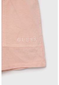Guess szorty bawełniane dziecięce kolor różowy gładkie regulowana talia. Okazja: na co dzień. Kolor: różowy. Materiał: bawełna. Wzór: gładki. Styl: casual