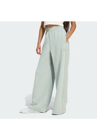 Adidas - Spodnie Soft Lux Straight Leg. Kolor: zielony. Materiał: materiał. Sport: fitness #1
