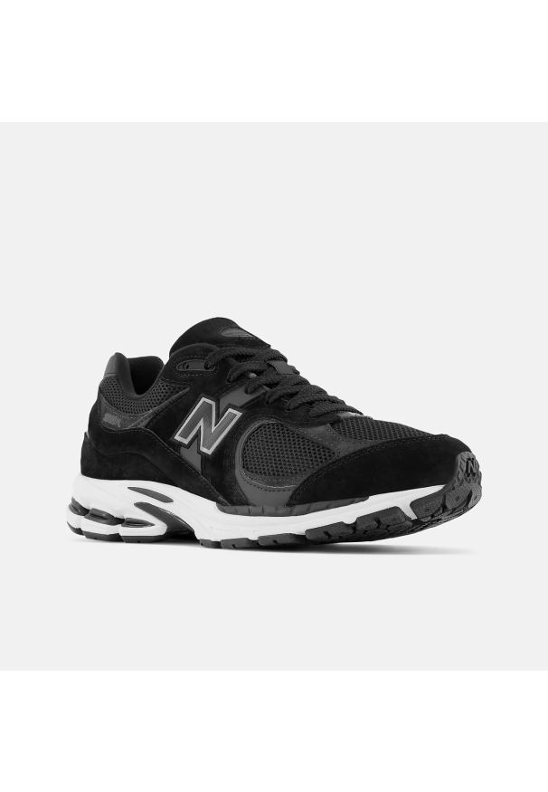 Sneakersy unisex New Balance M2002RBK Czarny. Kolor: czarny. Materiał: guma, syntetyk, skóra, materiał. Szerokość cholewki: normalna. Sport: turystyka piesza