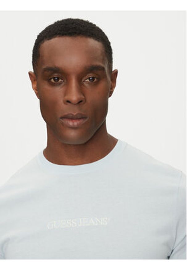 Guess Jeans T-Shirt M4YI52 K8HM0 Błękitny Regular Fit. Kolor: niebieski. Materiał: bawełna
