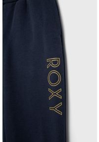 Roxy Spodnie dziecięce kolor granatowy z nadrukiem. Kolor: niebieski. Materiał: dzianina, włókno. Wzór: nadruk