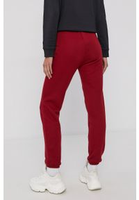 Champion Spodnie 114470 damskie kolor bordowy gładkie. Kolor: czerwony. Materiał: bawełna, dzianina. Wzór: gładki #2
