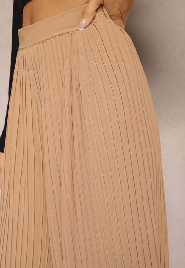 Renee - Beżowe Szerokie Spodnie z Plisami High Waist Mirealli. Stan: podwyższony. Kolor: beżowy
