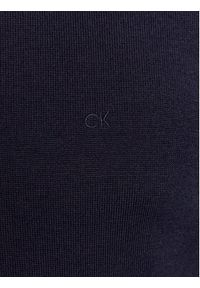 Calvin Klein Sweter K10K109474 Granatowy Regular Fit. Kolor: niebieski. Materiał: wełna