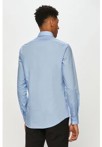 Calvin Klein - Koszula. Typ kołnierza: kołnierzyk klasyczny. Kolor: niebieski. Długość rękawa: długi rękaw. Długość: długie. Styl: klasyczny