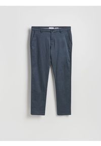 Reserved - Spodnie chino slim fit - granatowy. Kolor: niebieski. Materiał: tkanina, bawełna