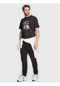 New Balance T-Shirt MT23569 Czarny Relaxed Fit. Kolor: czarny. Materiał: bawełna