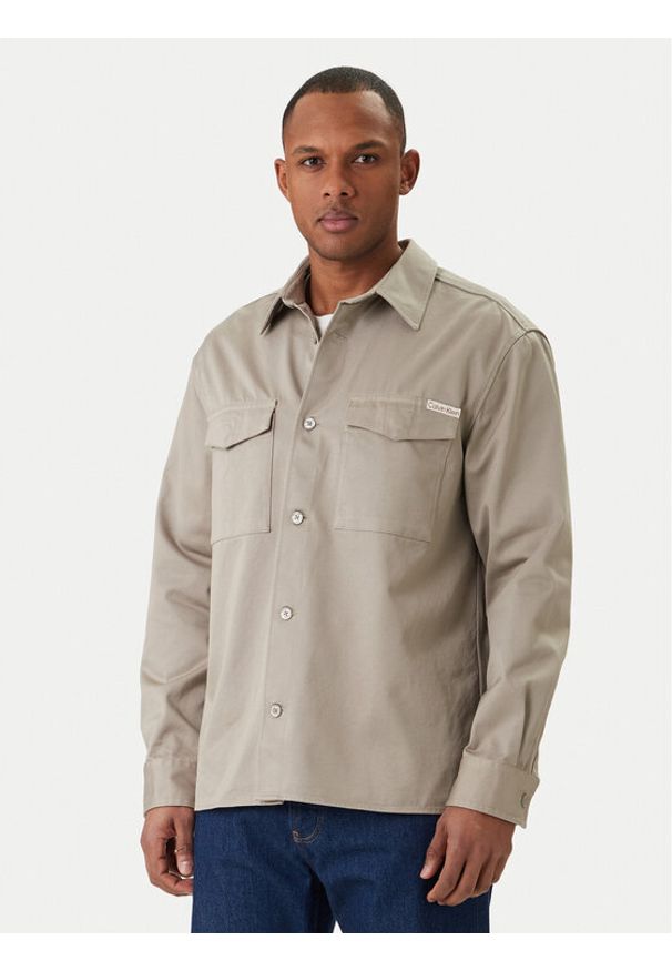 Calvin Klein Jeans Koszula Utility LV04RF408G Beżowy Relaxed Fit. Kolor: beżowy. Materiał: syntetyk