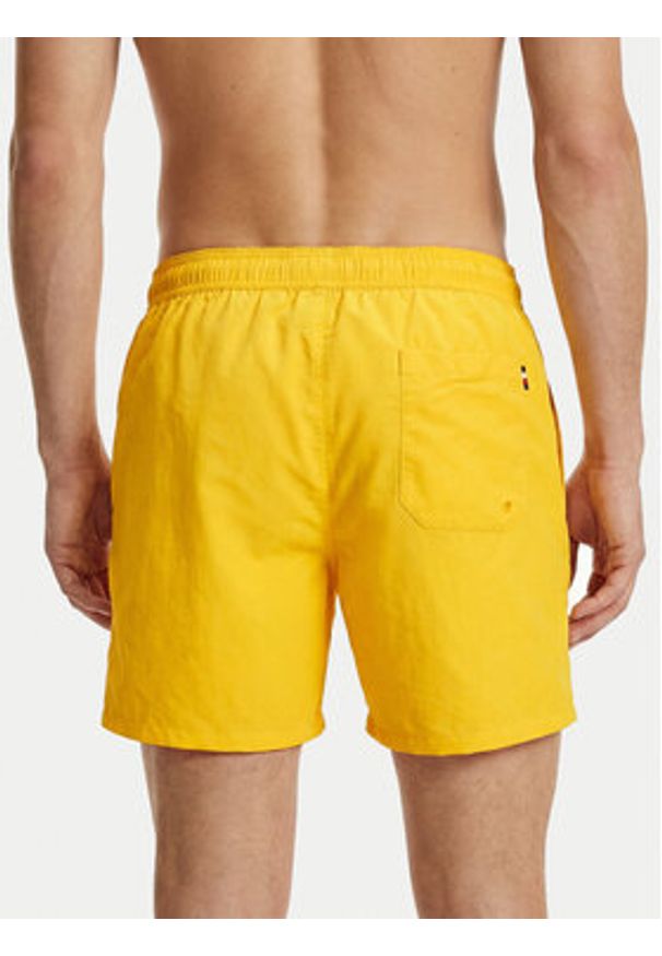 TOMMY HILFIGER - Tommy Hilfiger Szorty kąpielowe UM0UM03477 Żółty Regular Fit. Kolor: żółty. Materiał: syntetyk