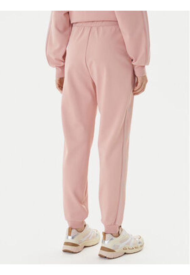 Guess Spodnie dresowe V5BB23 KCX22 Różowy Regular Fit. Kolor: różowy. Materiał: syntetyk