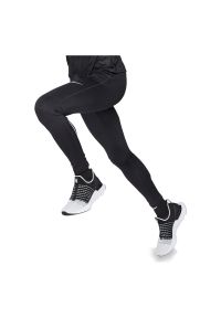 Spodnie legginsy męskie do biegania Nike Dri-FIT Challenger CZ8830. Materiał: materiał, poliester, skóra. Technologia: Dri-Fit (Nike). Sport: fitness #1
