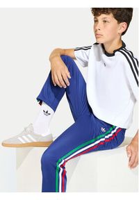 Adidas - adidas Spodnie dresowe Firebird KC9503 Niebieski Regular Fit. Kolor: niebieski. Materiał: syntetyk #5