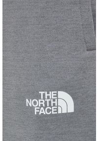 The North Face spodnie dresowe Mountain Athletics męskie kolor szary gładkie. Kolor: szary. Materiał: dresówka. Wzór: gładki #3