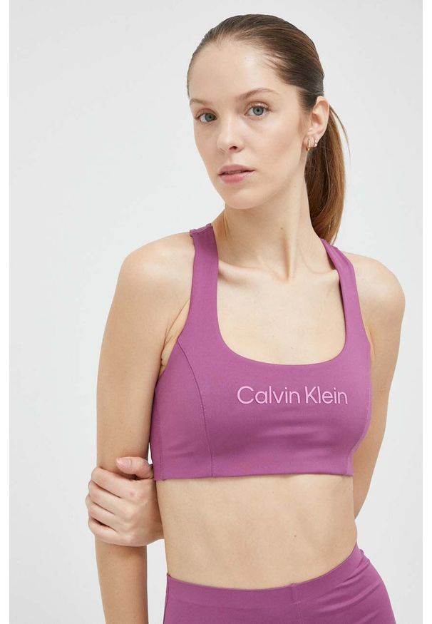 Calvin Klein Performance biustonosz sportowy Essentials kolor fioletowy. Kolor: fioletowy. Materiał: skóra. Sport: fitness, taniec