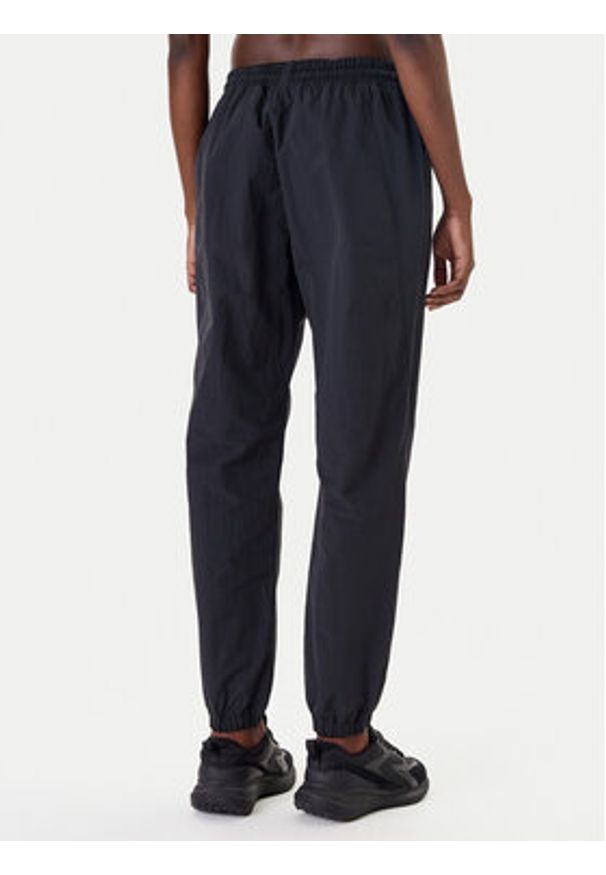 Reebok Spodnie dresowe Vector 100221435 Czarny Relaxed Fit. Kolor: czarny. Materiał: syntetyk