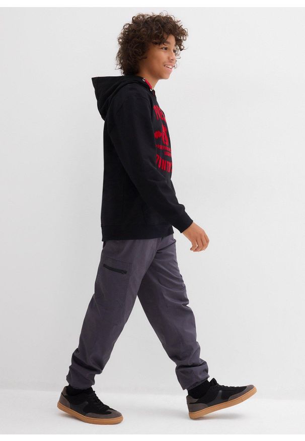 bonprix - Ocieplane spodnie bojówki z dżersejową podszewką o kroju loose fit. Kolor: szary. Materiał: jersey