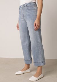 Born2be - Niebieskie Jeansy Kuloty z Bawełną o Szerokim Kroju z Wysokim Stanem z Przeszyciami Hippesilea. Okazja: na co dzień. Stan: podwyższony. Kolor: niebieski. Styl: casual #8