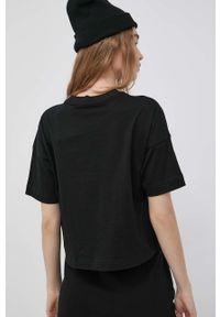 Puma t-shirt damski kolor czarny. Kolor: czarny. Materiał: dzianina. Wzór: aplikacja
