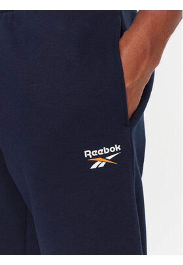 Reebok Spodnie dresowe RK25146CCM Granatowy Regular Fit. Kolor: niebieski. Materiał: bawełna