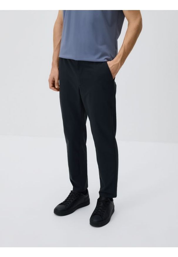 Reserved - Spodnie chino slim fit - czarny. Kolor: czarny. Materiał: dzianina