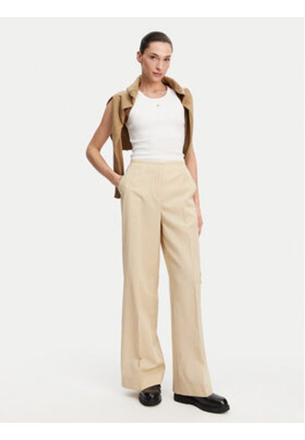 Calvin Klein Spodnie materiałowe K20K208168 Beżowy Wide Leg. Kolor: beżowy. Materiał: bawełna