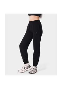 Spodnie dresowe sportowe dla kobiet Carpatree Varsity Chic. Kolor: czarny. Materiał: dresówka. Sport: fitness