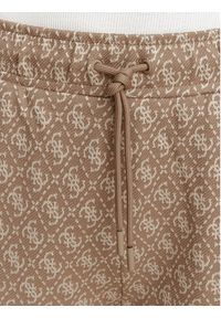 Guess Spodnie dresowe V6YB27 K5181 Brązowy jasny Relaxed Fit. Kolor: brązowy. Materiał: syntetyk #2